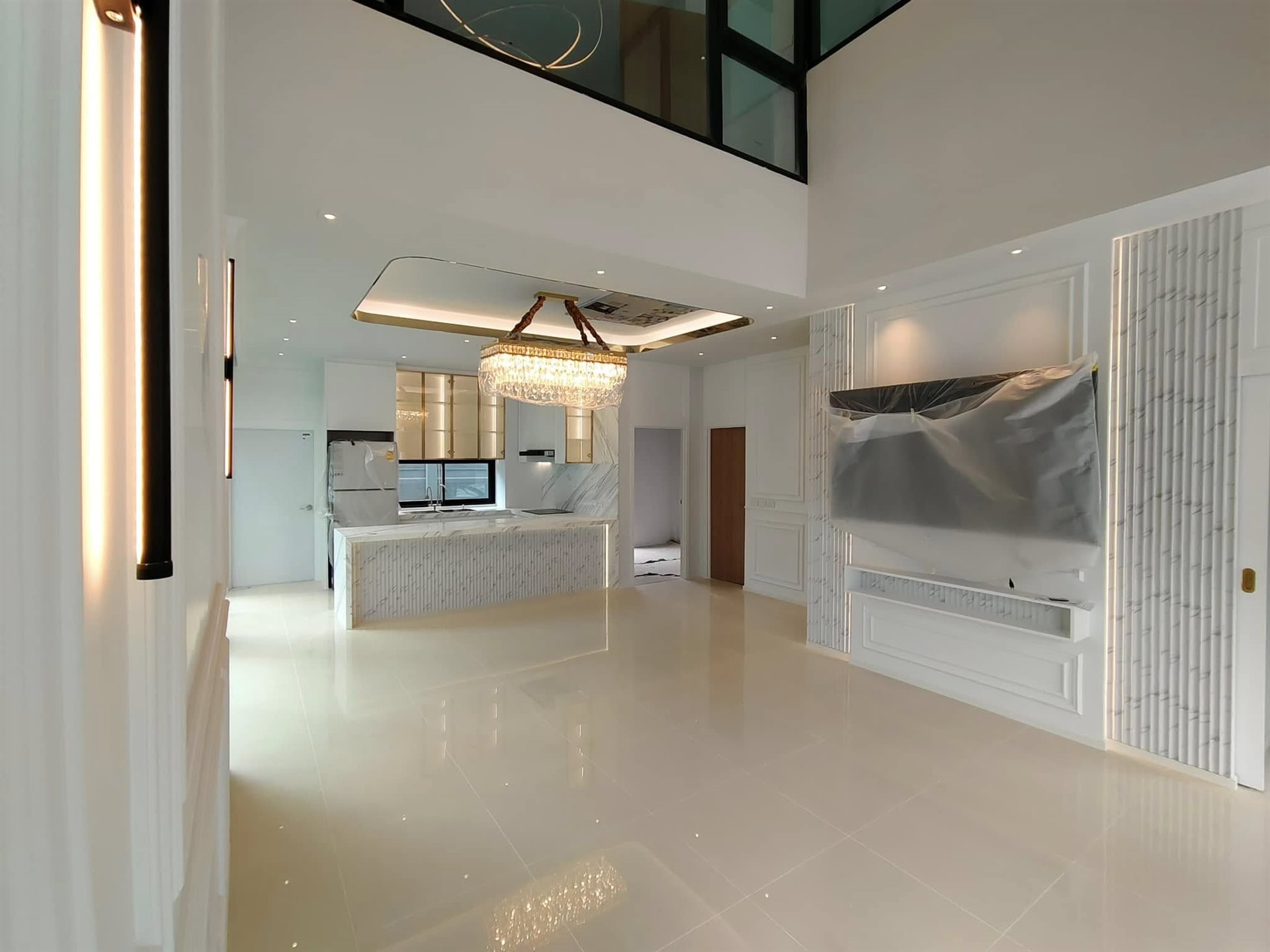 พื้นที่นั่งเล่นและครัวบิวท์อิน Nue Connex House Donmueang